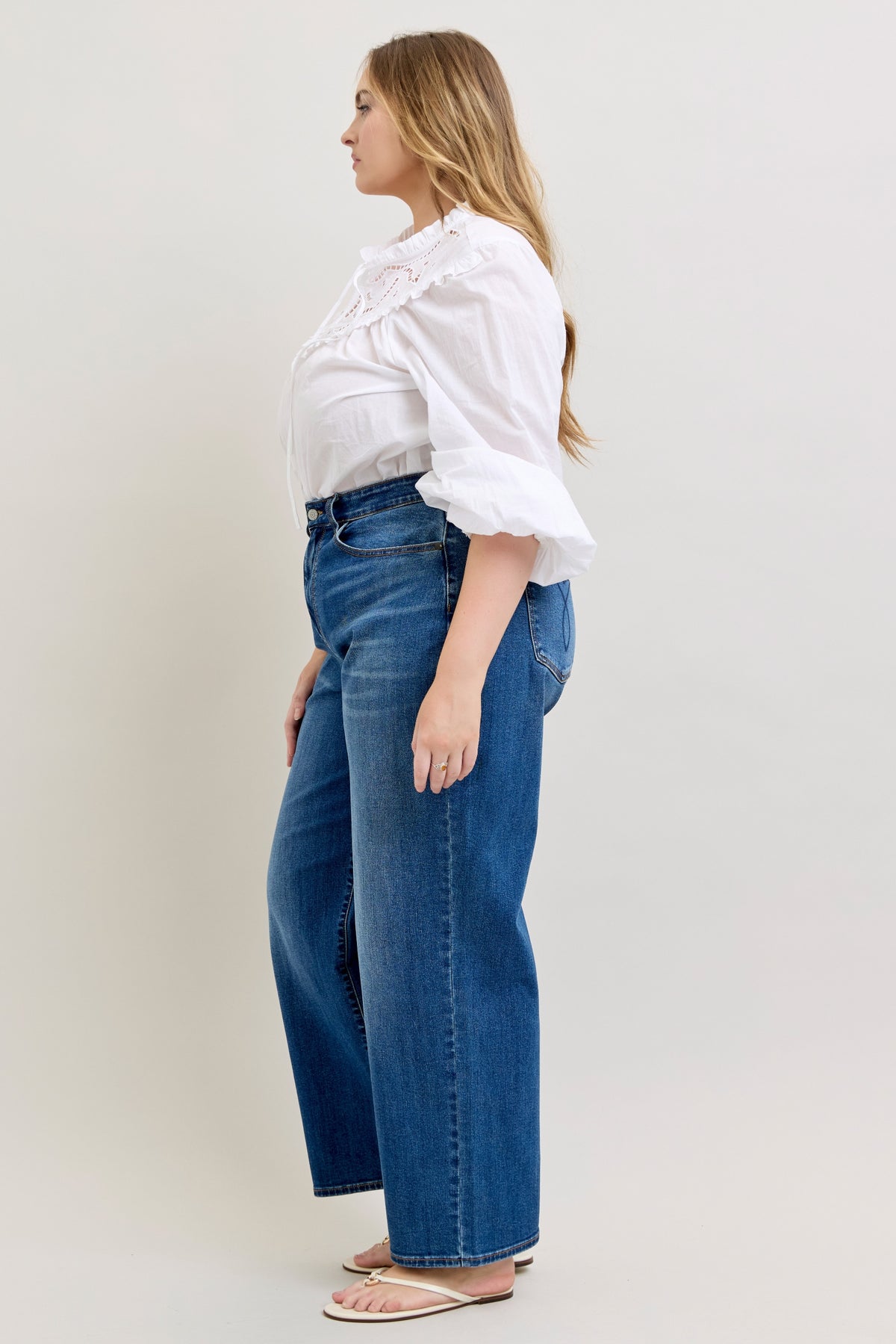 Judy Blue Wilhelmina baggy jean in dark wash, side view showing the loose leg