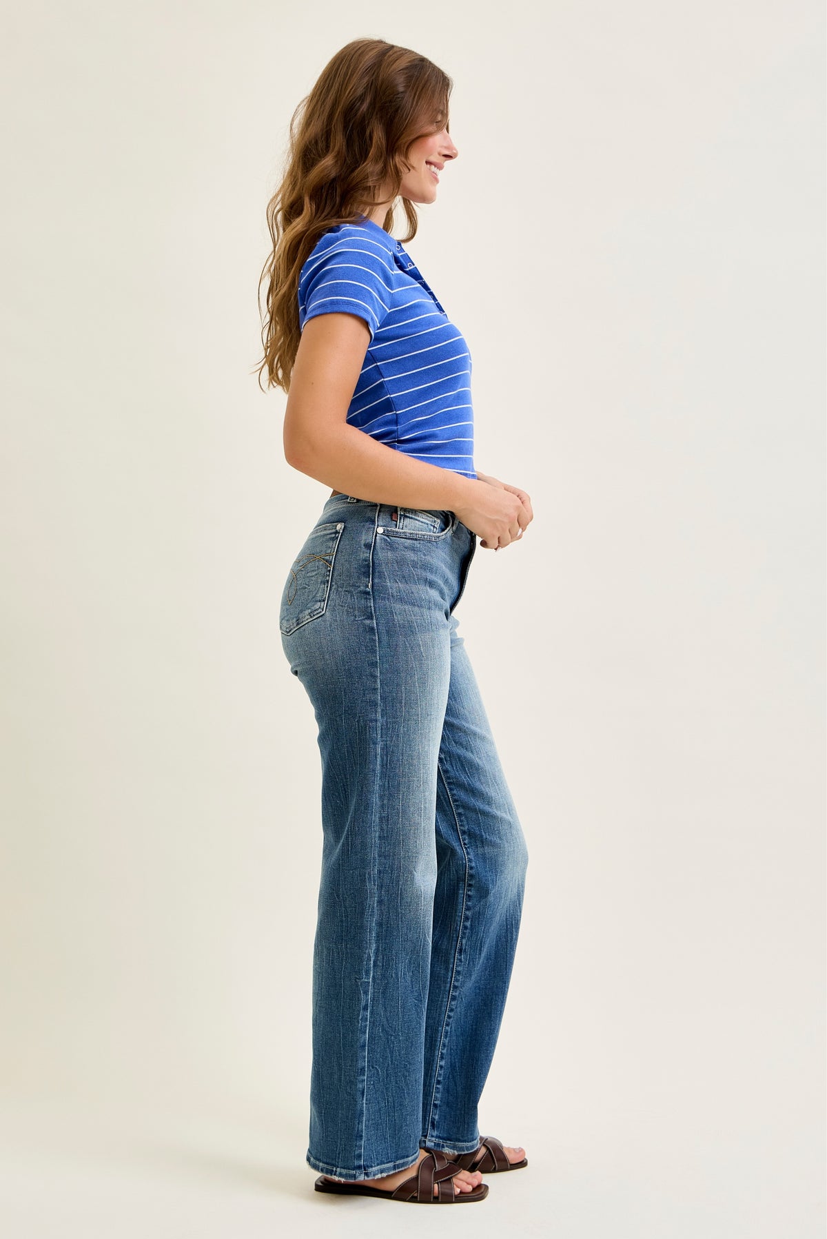Judy Blue mid rise straight leg jean in medium wash, full length styling view