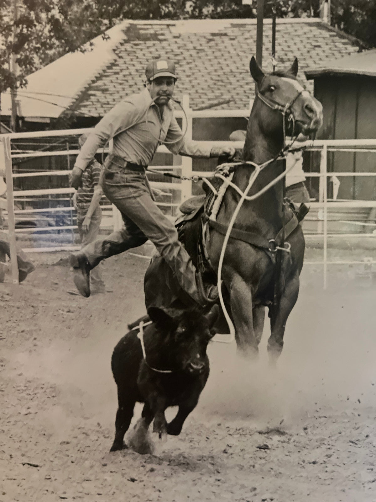 Old photo of George Nigro roping at a rodeo