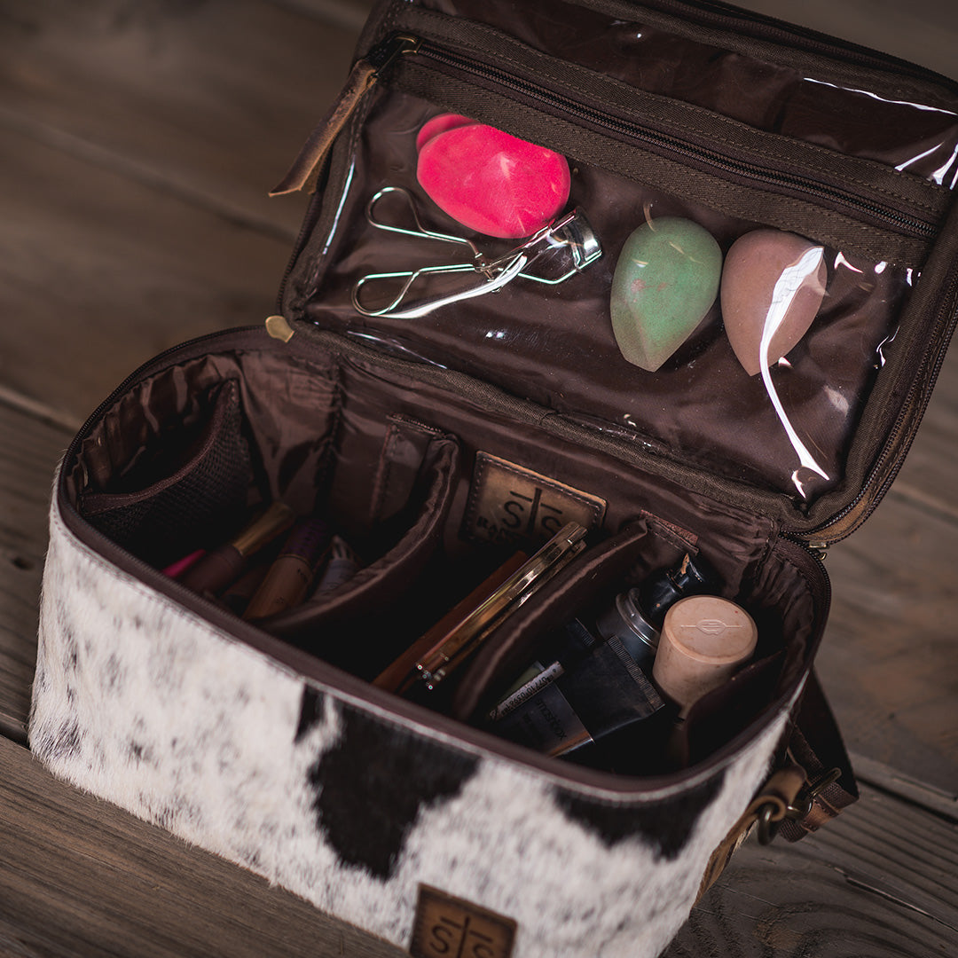 STS Ranchwear Women's Cowhide Glamour Makeup Organizer, Tan and Black Hair-On – lifestyle, open with makeup