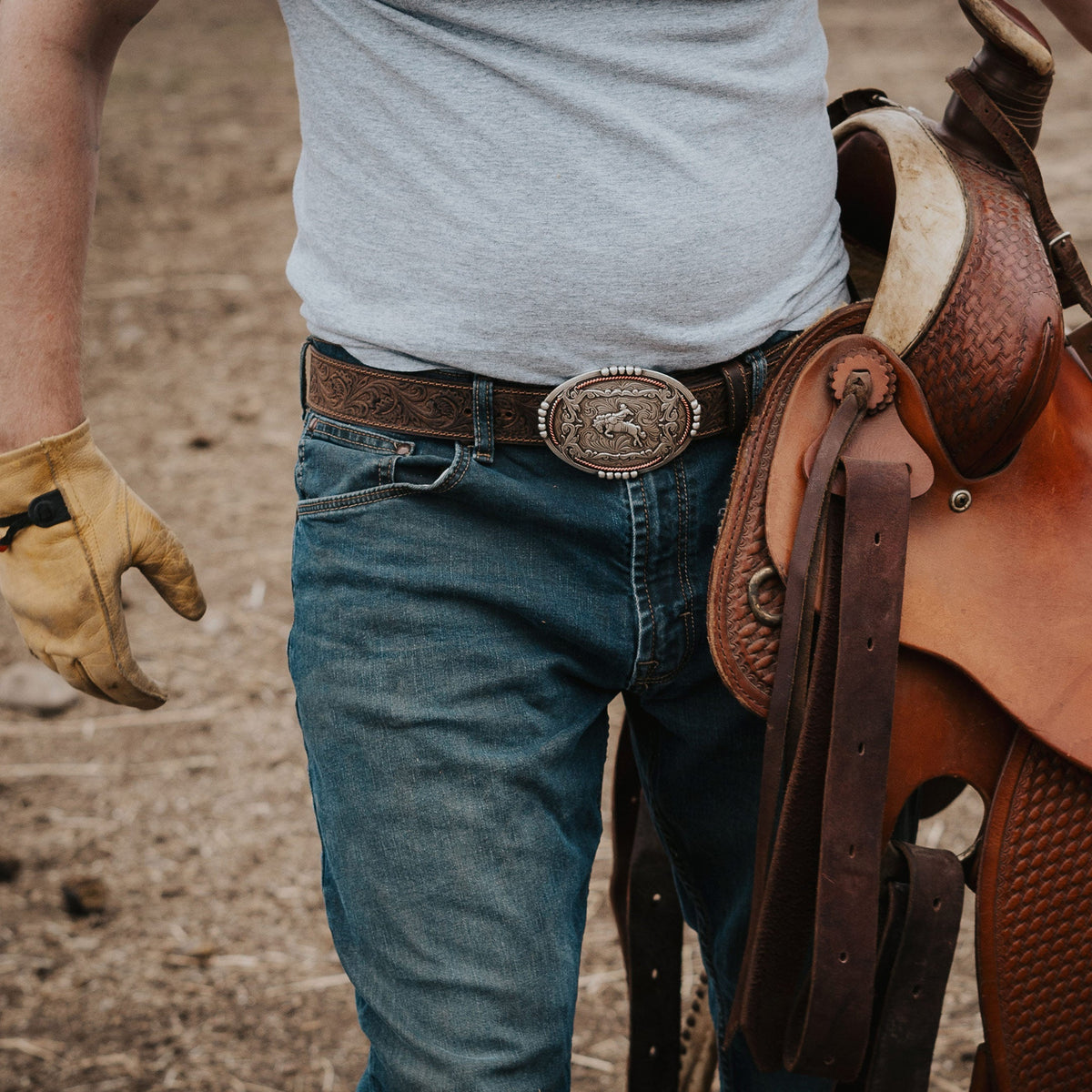 AndWest 1 1/2-inch tooled Buckin’ Bronc Rider buckle belt with detailed tooling and western design for men's casual wear