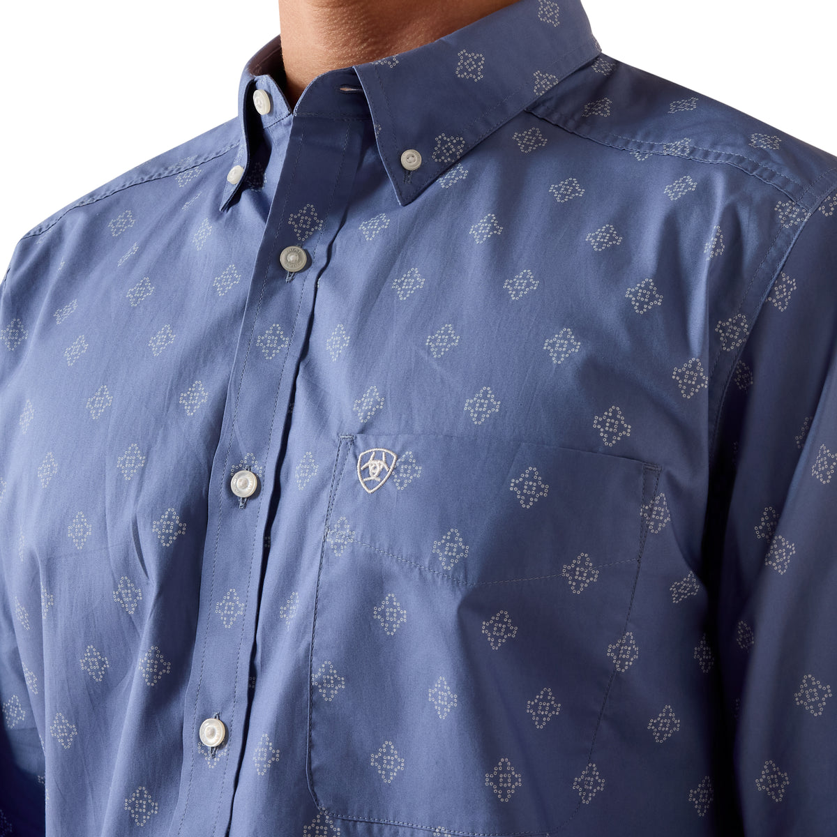 Ariat men's Byrd fitted shirt in colony blue with a southwest motif, featuring a casual button-up style and southwestern pattern.