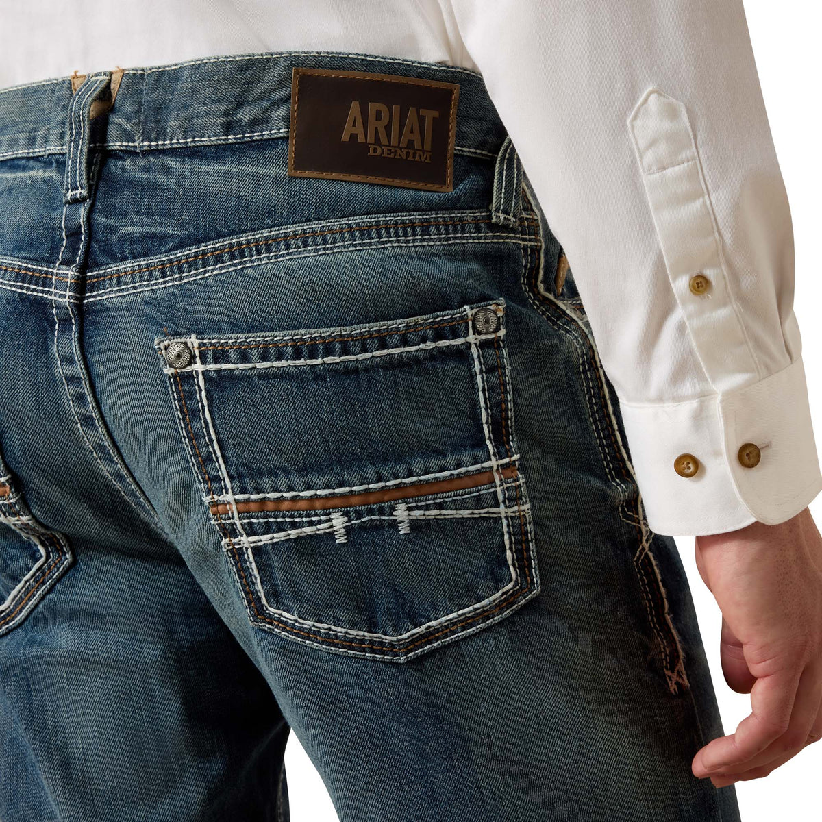 Ariat Men's M4 Coltrane boot cut jeans in Durango wash, denim with classic five-pocket style and straight leg fit.