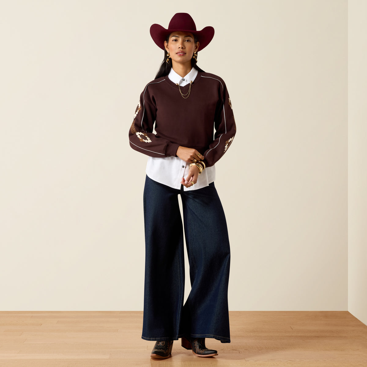 Ariat Women's Dakota Sweatshirt in chocolate plum, cozy fit with soft fabric and stylish color detail.