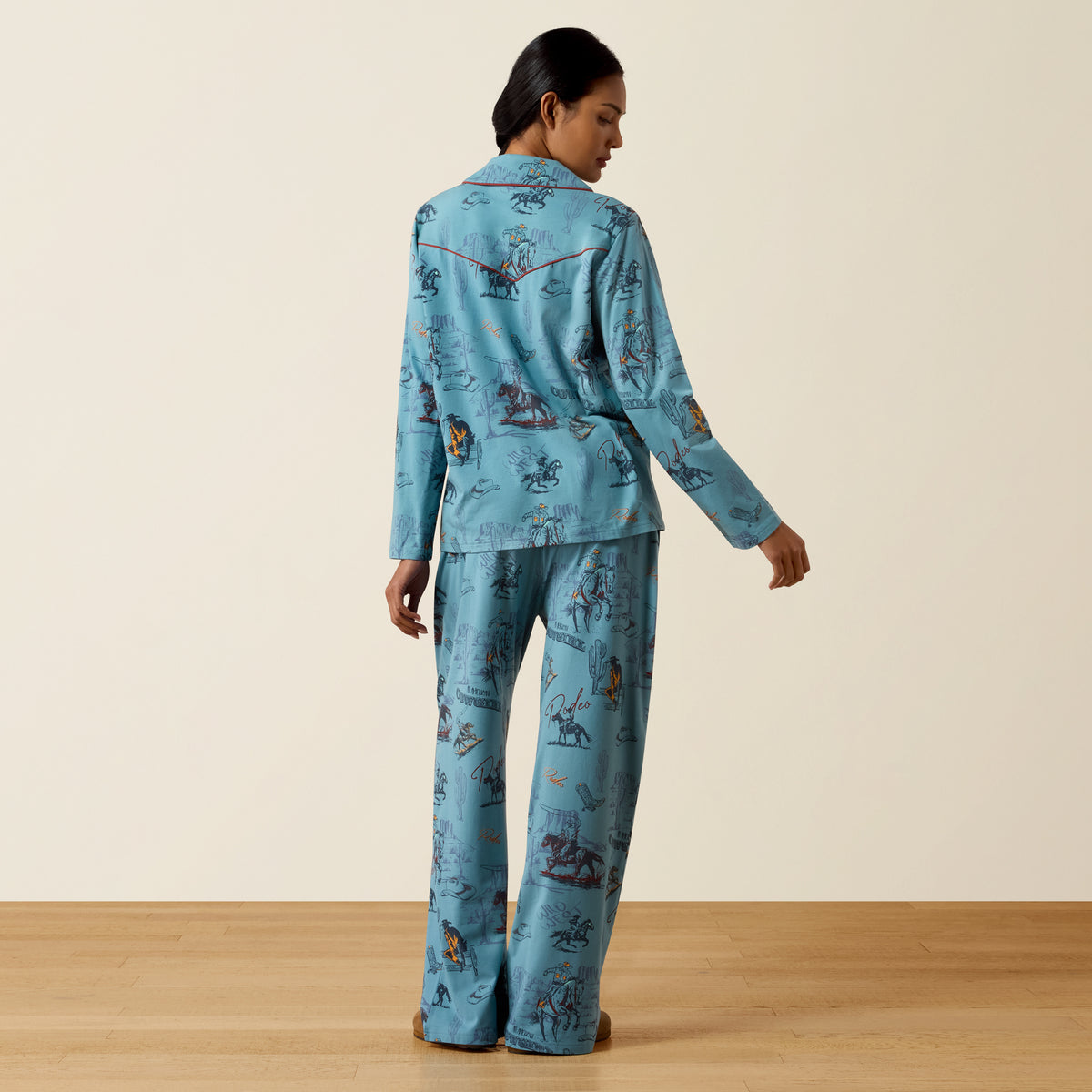 Ariat Women's Dreams Pajama Set in Retro Rodeo print, featuring comfortable pajama top and pants with rodeo-themed design.