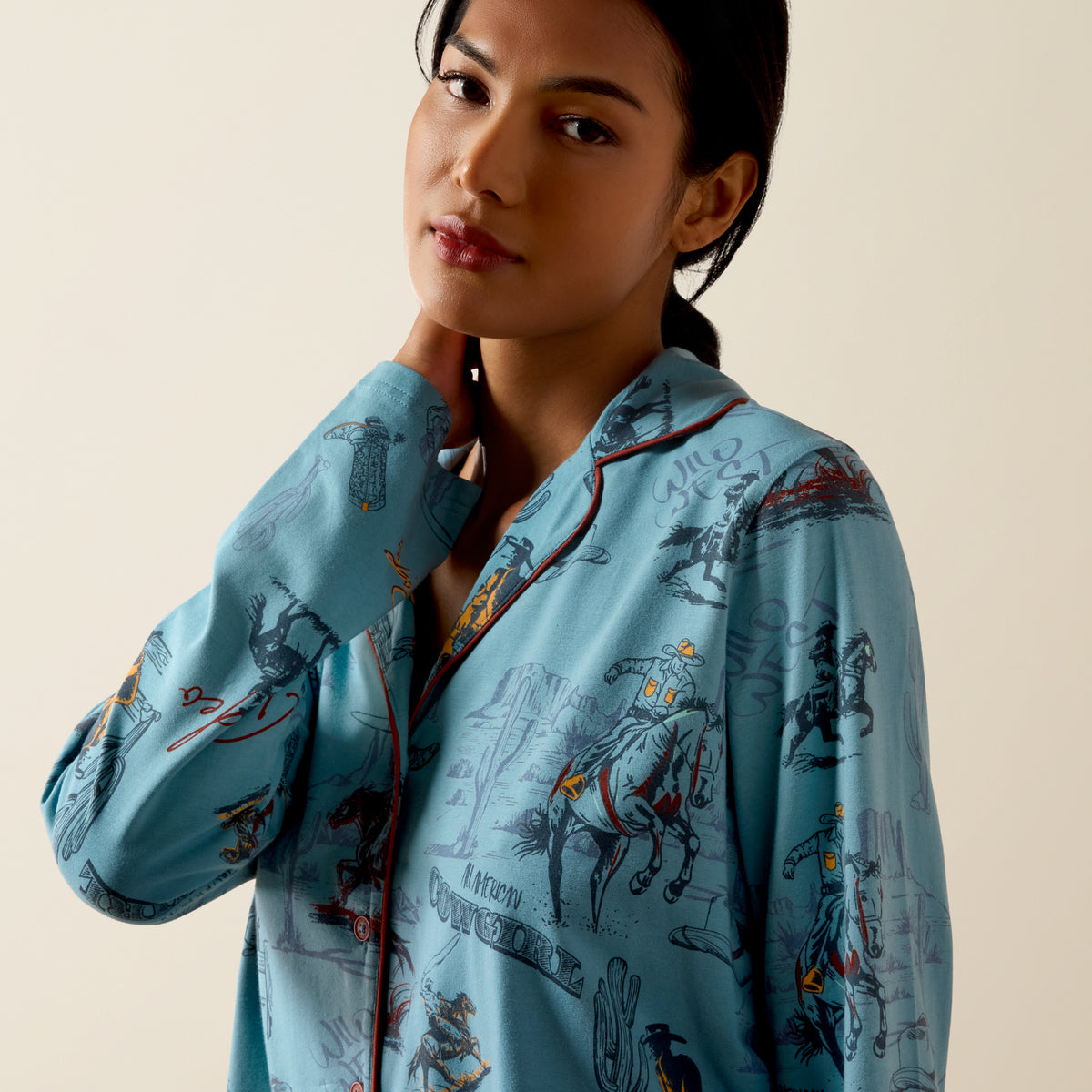 Ariat Women's Dreams Pajama Set featuring retro rodeo design, soft fabric, and comfortable fit for sleepwear.