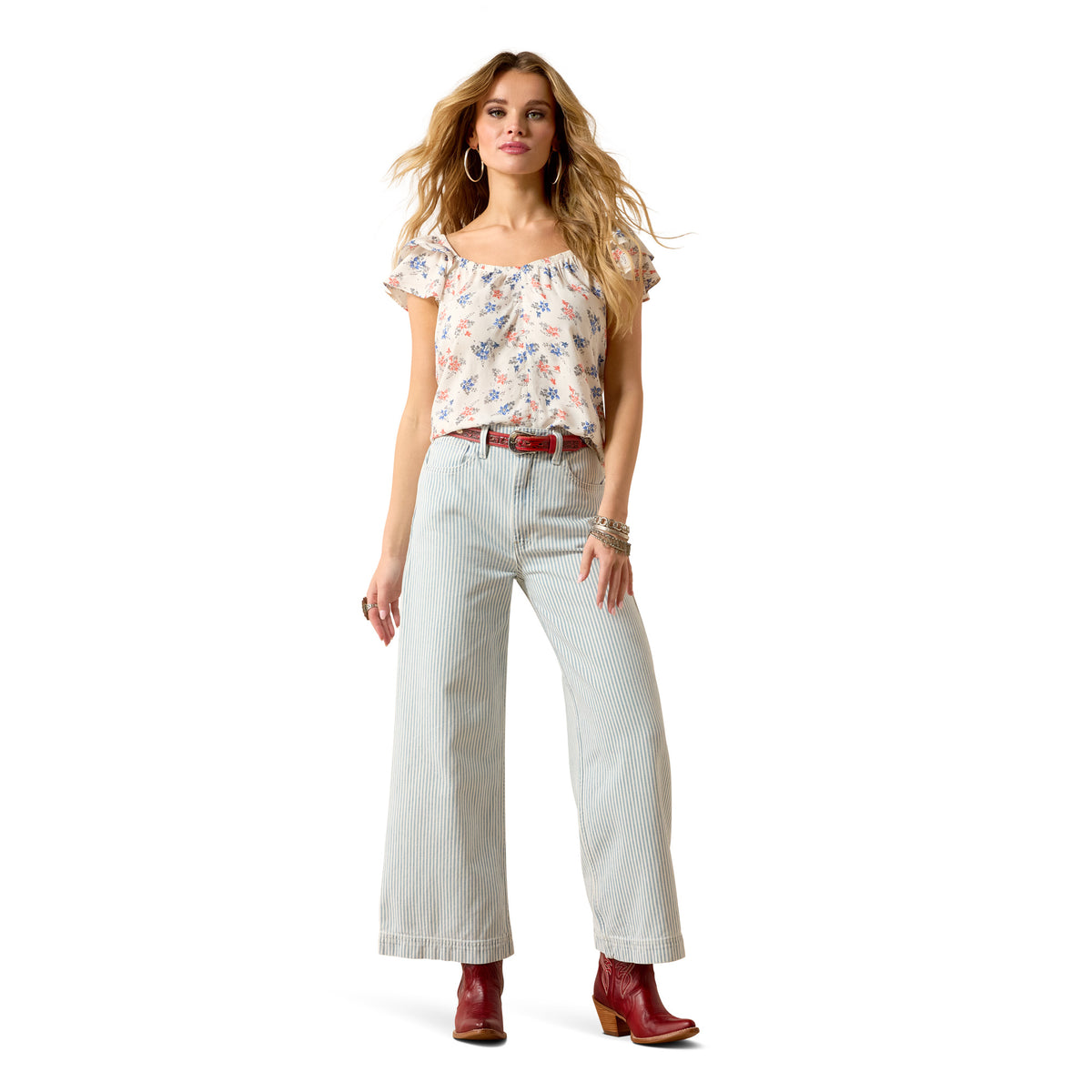 Ariat Women's Lynn Top floral print shirt with long sleeves and V-neck, featuring vibrant floral patterns on lightweight fabric.
