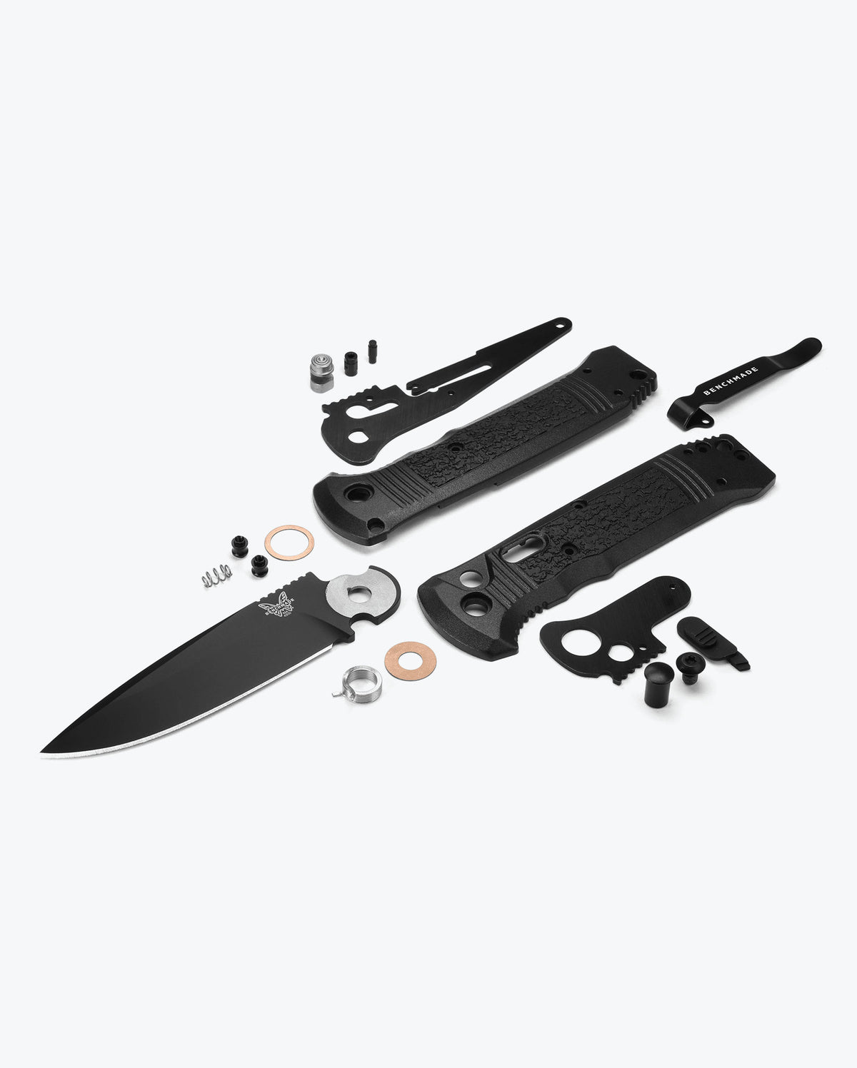 Benchmade Casbah knife with black Grivory handle and partially serrated blade, designed for durability and precision cutting.