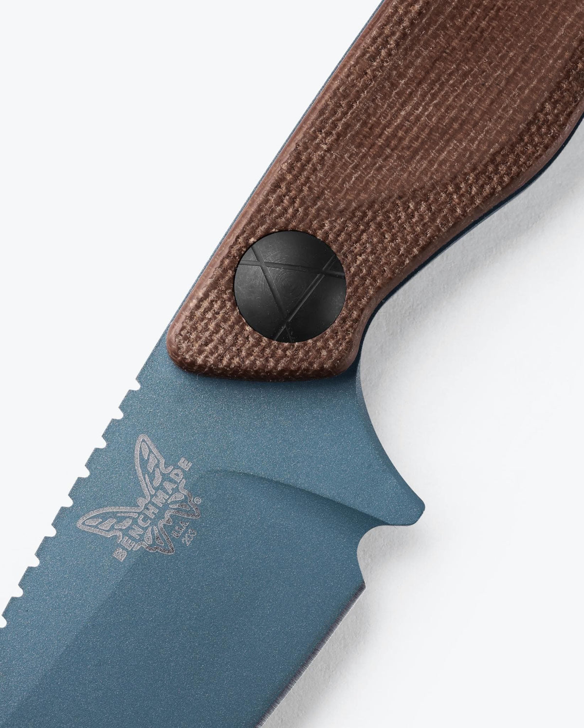 Benchmade Dacian® knife with brown canvas Micarta handle and spear-point blade, showcasing its sharp, durable design.