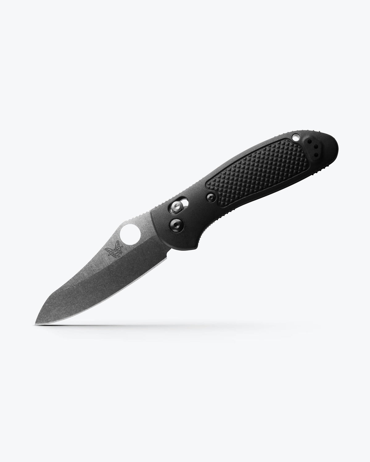 Benchmade Griptilian knife with black Grivory handle and sheepsfoot blade, showcasing its compact, durable design.
