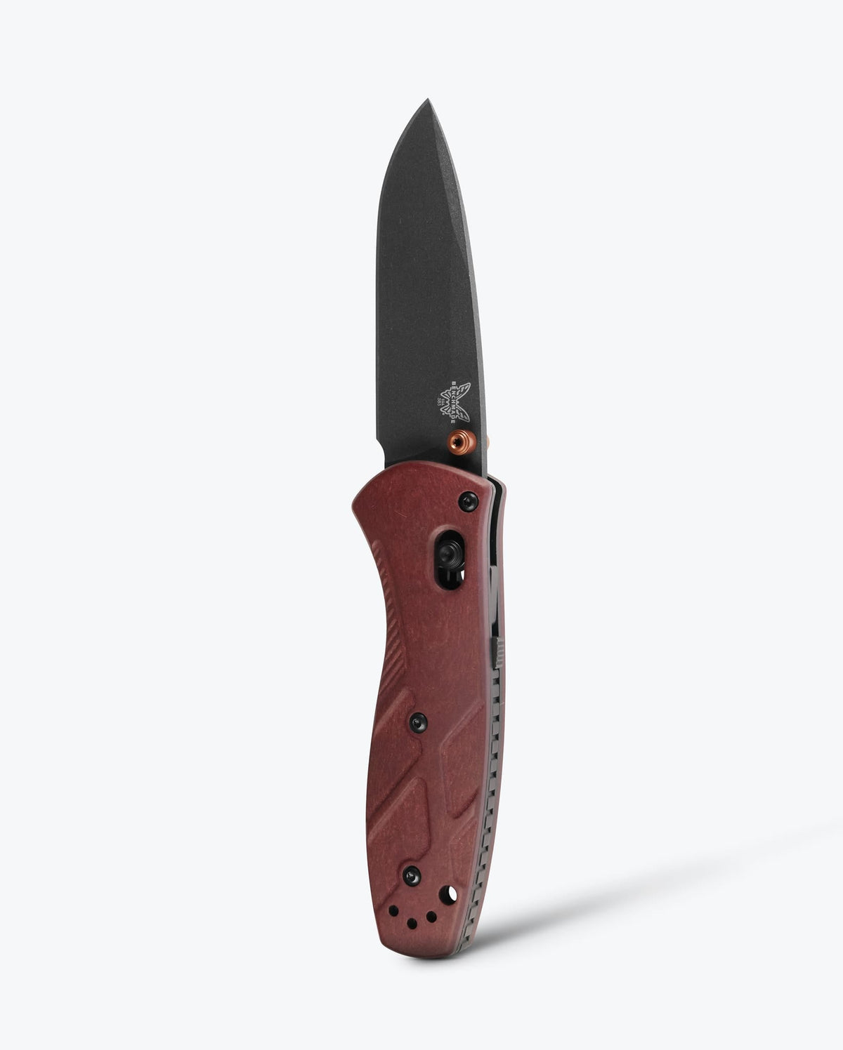 Benchmade Mini Barrage knife with redstone handle and drop-point blade, showcasing its compact, durable design.