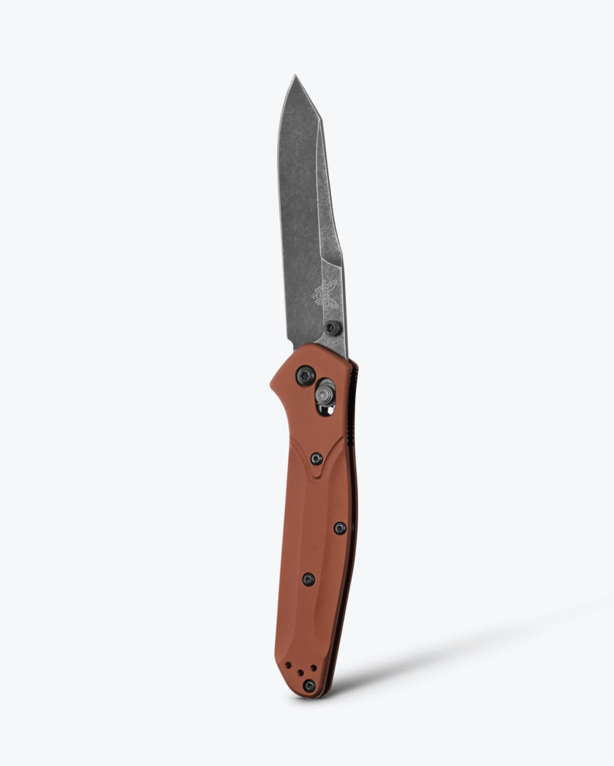 Benchmade Osborne knife with burnt copper aluminum handle and reverse tanto blade, showcasing a sleek and durable design.