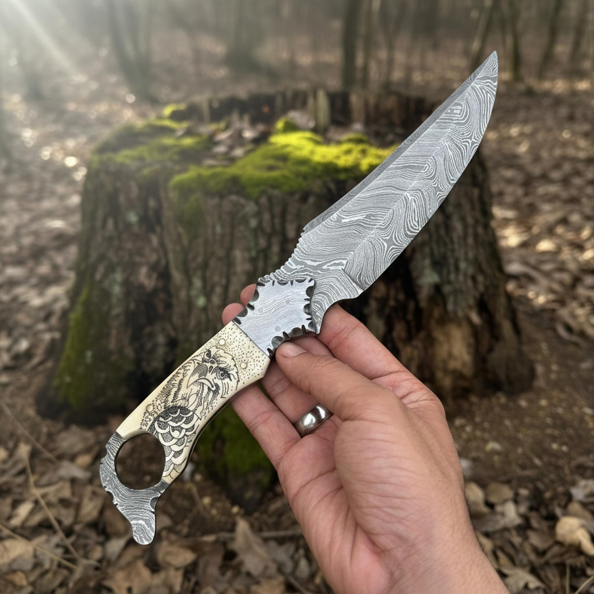 Malika Knives Biker Ringtail Knife with Damascus steel blade and camel bone handle, suitable for everyday carry.
