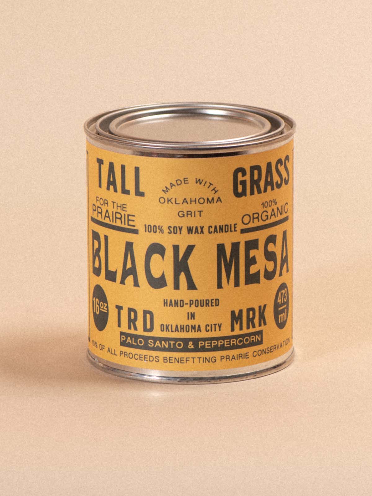 Tallgrass Supply Black Mesa Palo Santo and Peppercorn soy wax candle with a sleek black container and natural wooden wick.