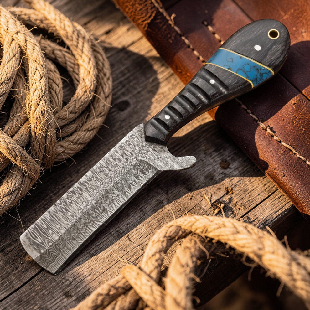 Malika Knives Bull Cutter Knife with 1095 Damascus steel blade and cowboy-style handle, designed for rugged cutting tasks.