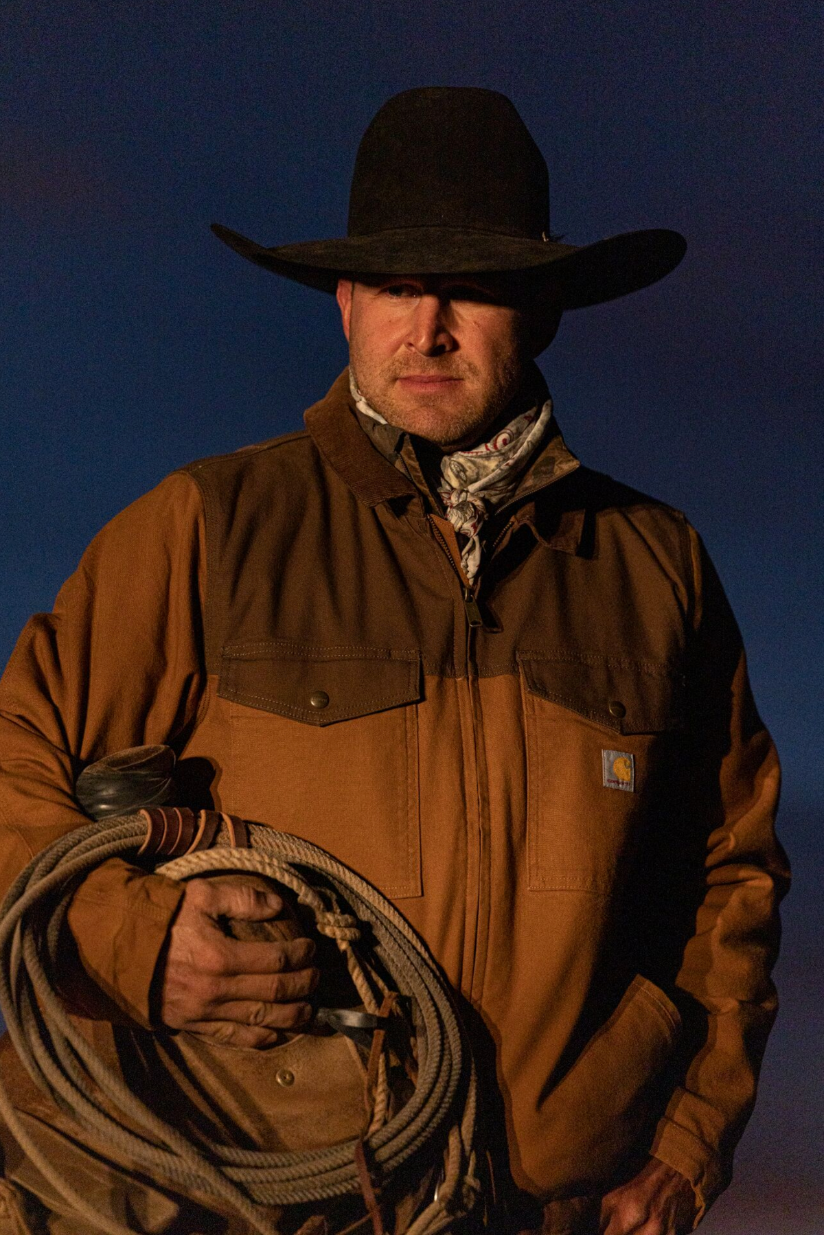 Carhartt Men's Montana Rugged Flex insulated duck jacket in brown and coffee with relaxed fit and durable overcoat style.