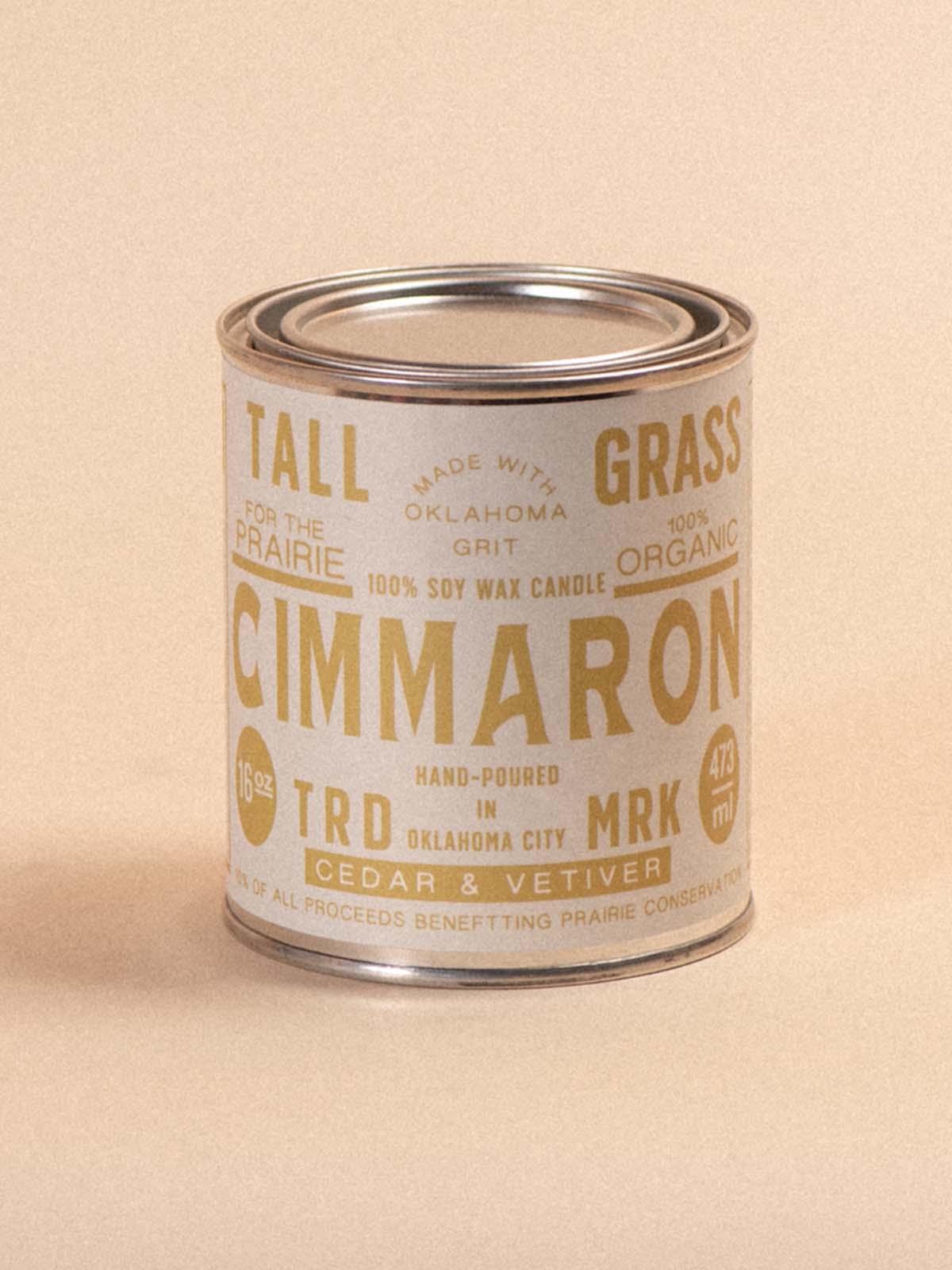 Tallgrass Supply Cimmaron cedar and vetiver soy wax candle with a natural wooden wick and minimalist glass jar.