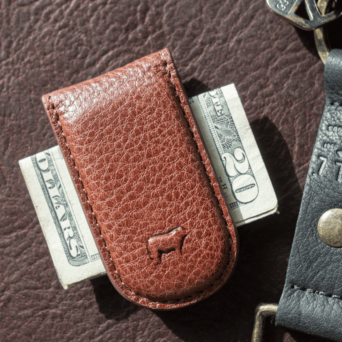 Will Leather Goods classic leather money clip attached to a sleek wallet, showcasing durable craftsmanship and minimalist design.