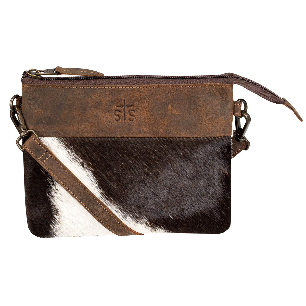 STS Ranchwear Cowhide Rio Crossbody bag with leather strap and western style, featuring natural cowhide pattern and stitching details.