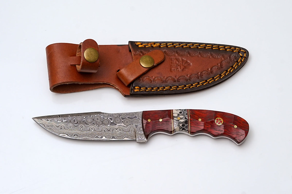 Crimson Mirage Titan Limited Series TK-450 Damascus steel knife with a vibrant red handle and polished blade.