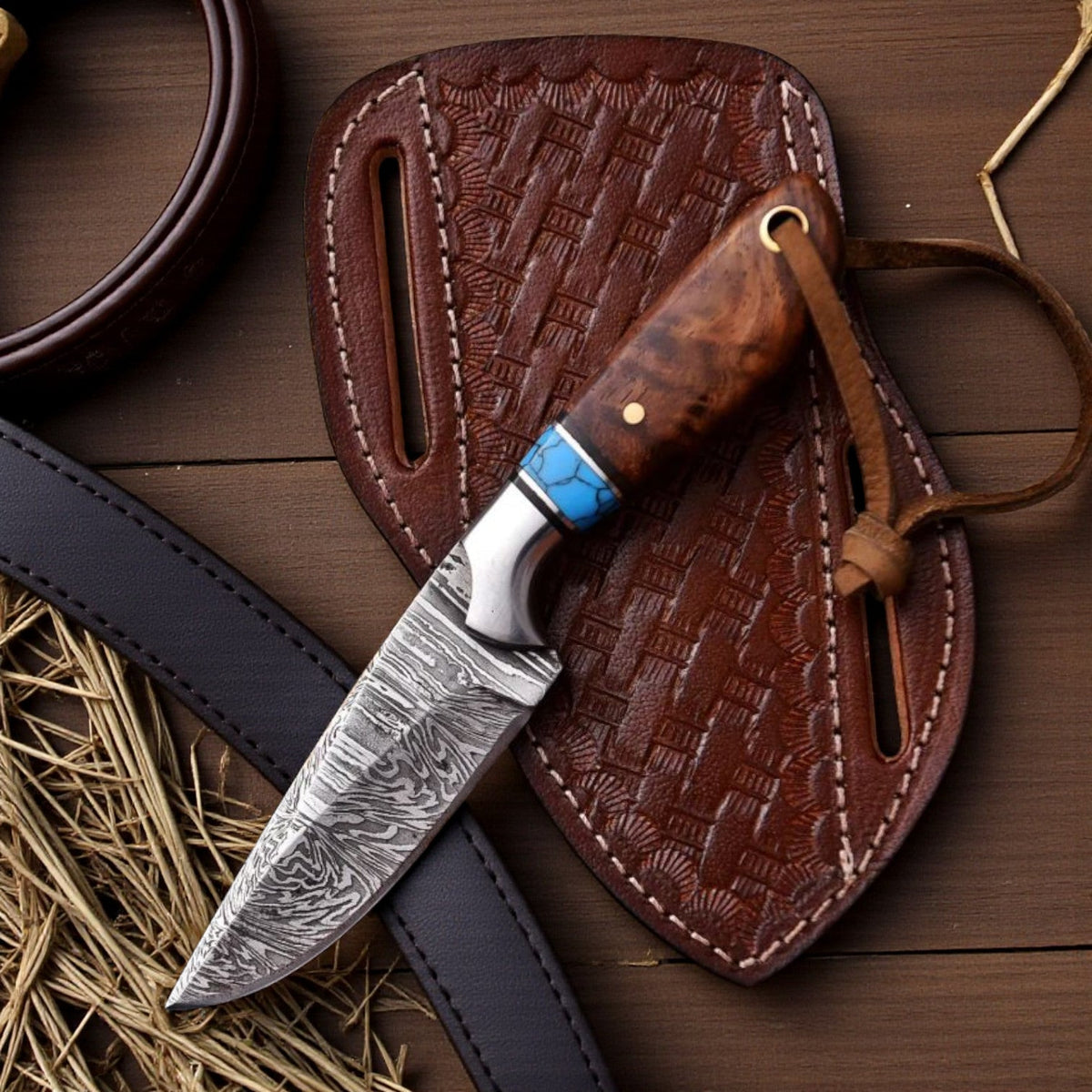 Malika Knives Damascus cowboy hunting knife with rosewood handle and pancake sheath, showcasing a sleek, simple design.