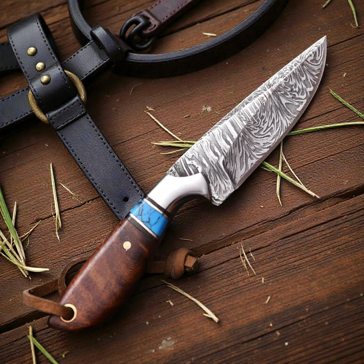 Malika Knives Damascus cowboy hunting knife with rosewood handle and pancake sheath, designed for outdoor hunting and camping.