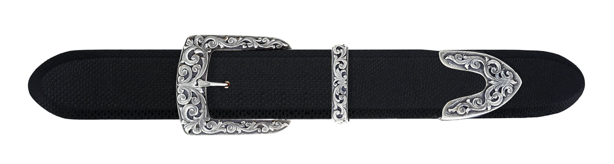 Clint Orms Galveston 2014 sterling silver buckle, keeper and tip shown together on a black belt