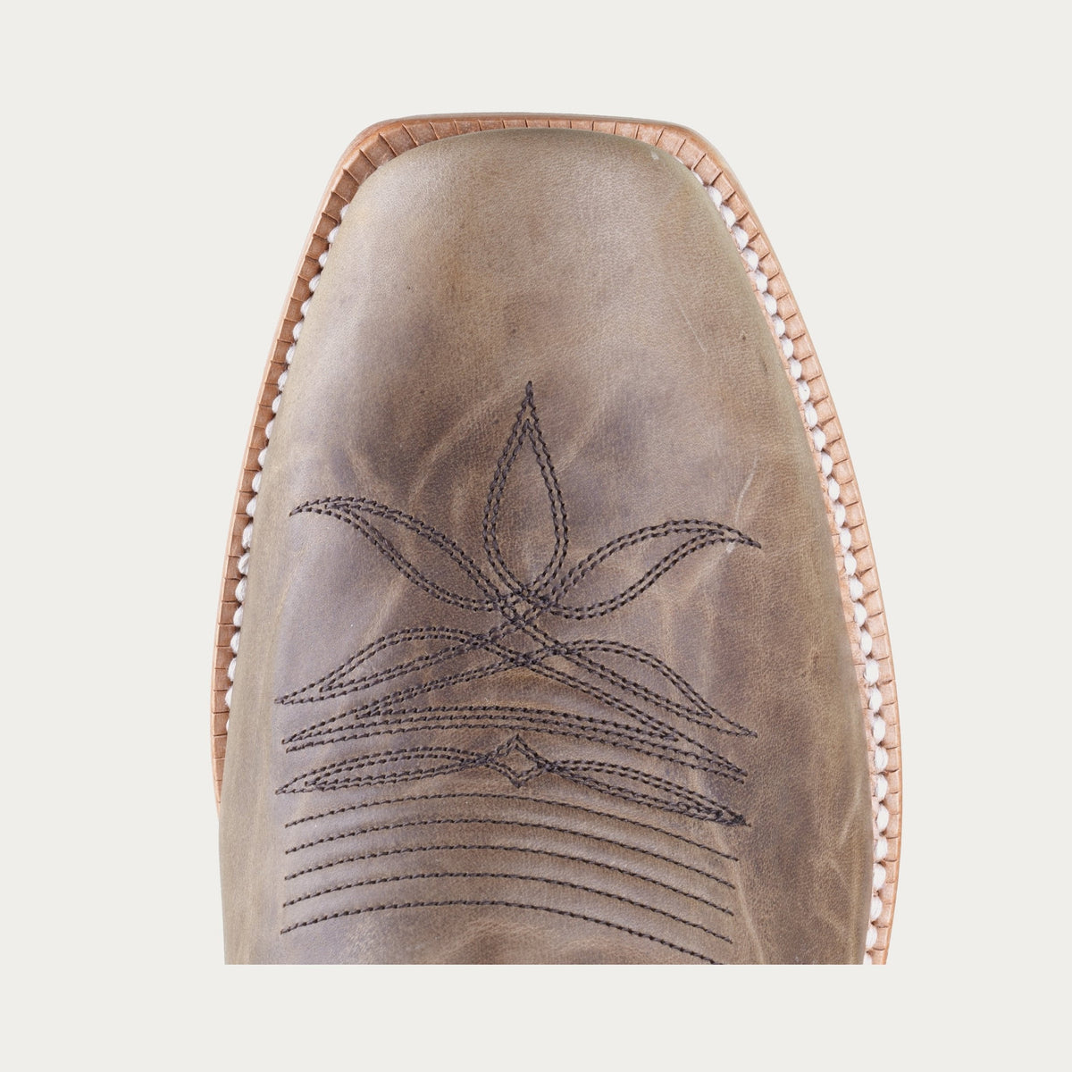 Hyer Stafford cowhide cutter toe boot in tan and brown with sturdy sole and classic Western style.