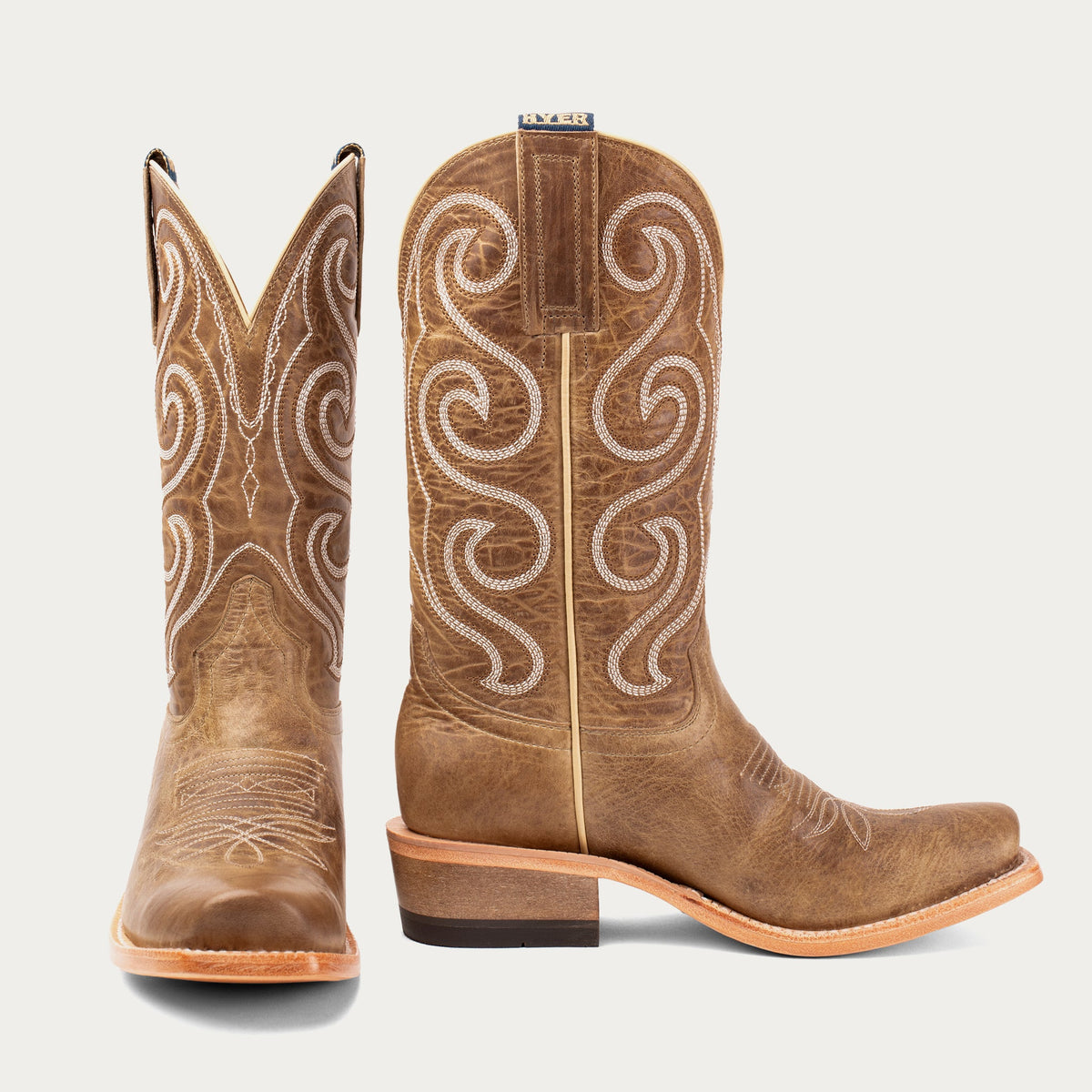 HYER Women's Meridian Boot showing black leather ankle boot with chunky heel and side zipper detail.