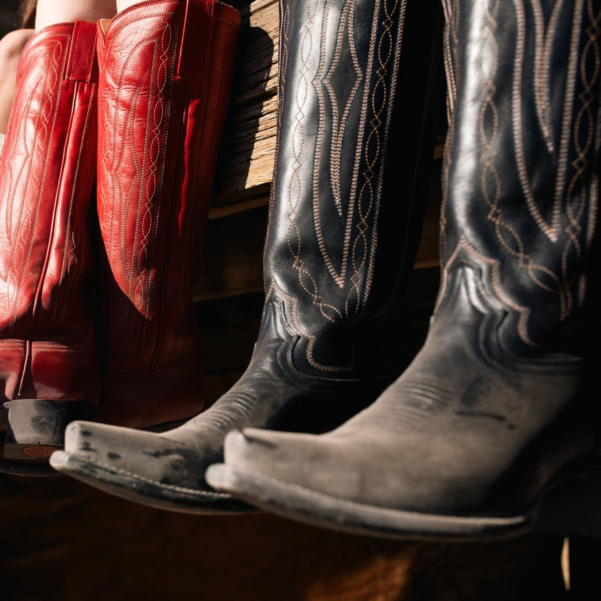 HYER Women's Wildcat Tall Black Boots, knee-high leather boots with sleek design and pointed toes.