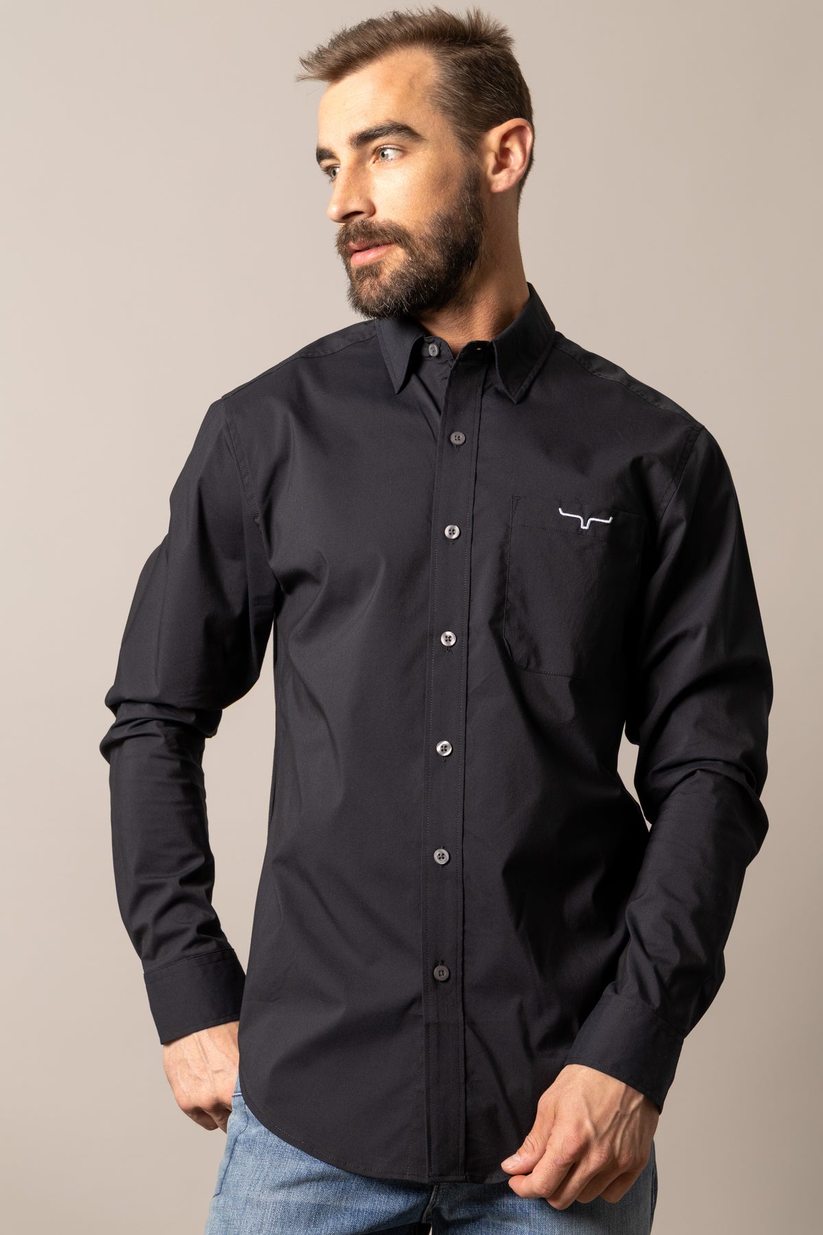 Kimes Ranch men's black Team Shirt with logo and button-up style, featuring a classic collar and chest pocket.