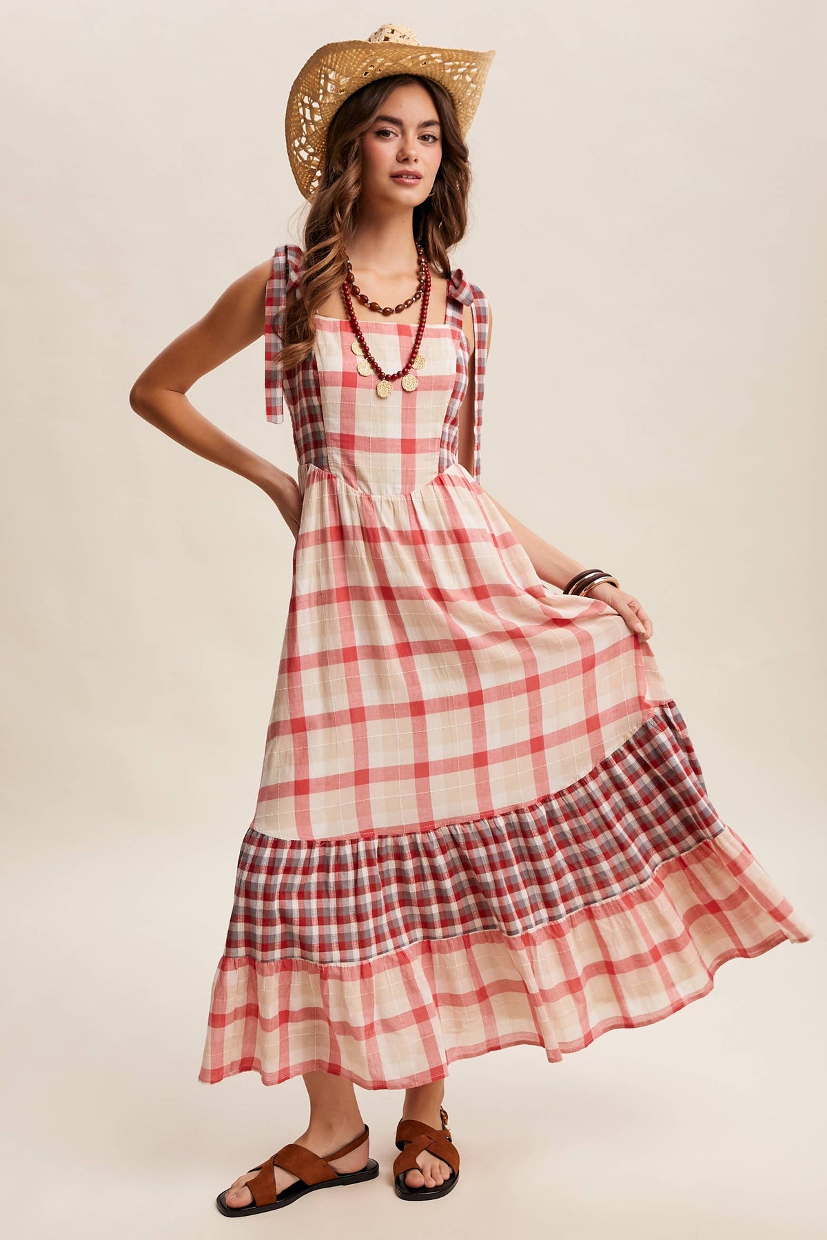 Gingham tiered maxi dress by Listicle featuring a flowy silhouette and sleeveless design, perfect for summer wear.