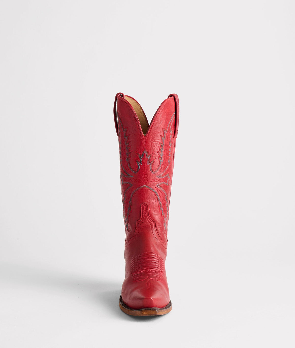 Red Lucchese Savannah boot with detailed stitching and classic Western design, showcasing leather craftsmanship.