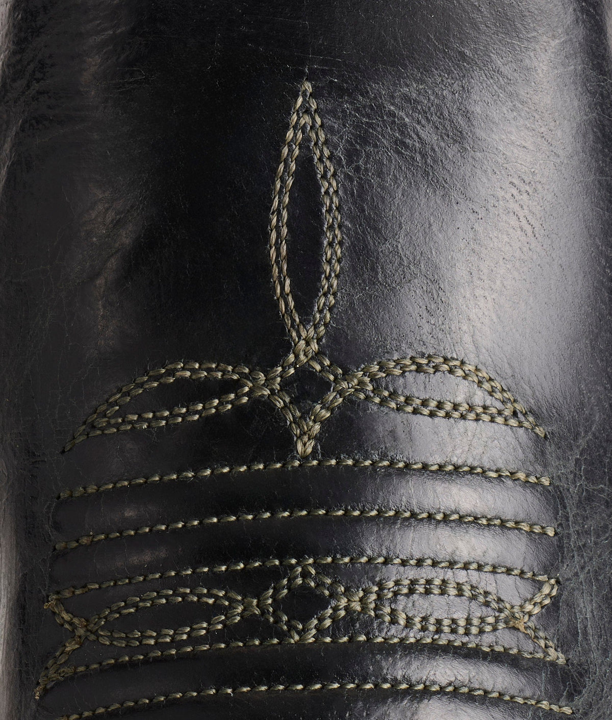 Black Lucchese Women's Savannah boots with pointed toes and decorative stitching, stylish western ankle footwear.