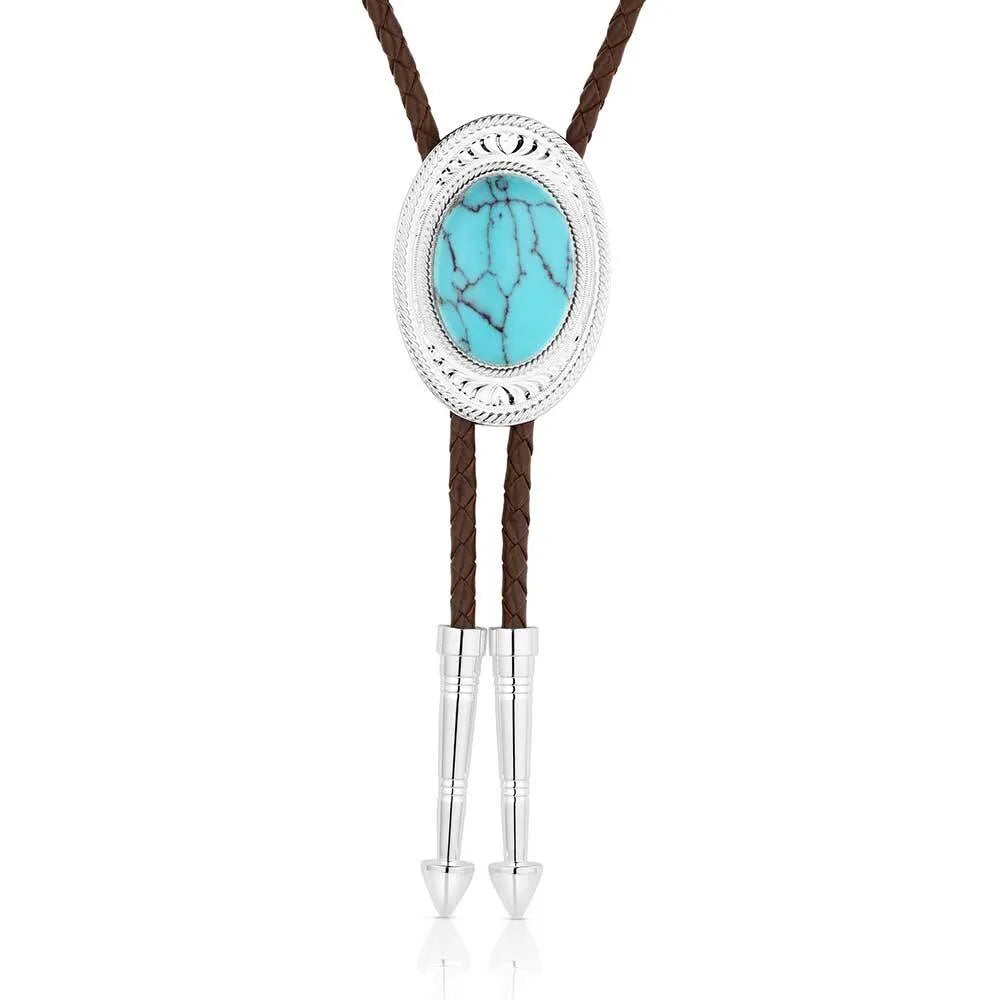 Montana Silversmiths The Outlaw turquoise bolo tie with silver accents and detailed Western-inspired design.