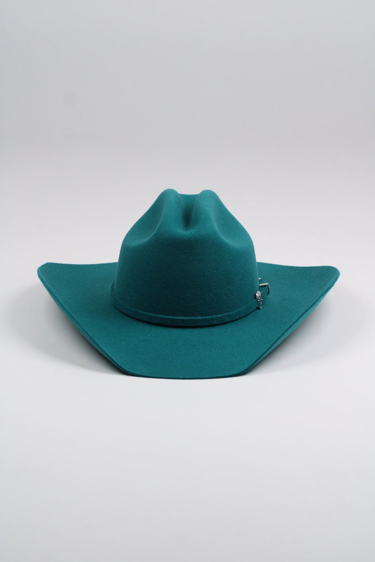 Wilder and Soul Mustang in turquoise, featuring a sleek leather design with silver hardware and a detachable strap.