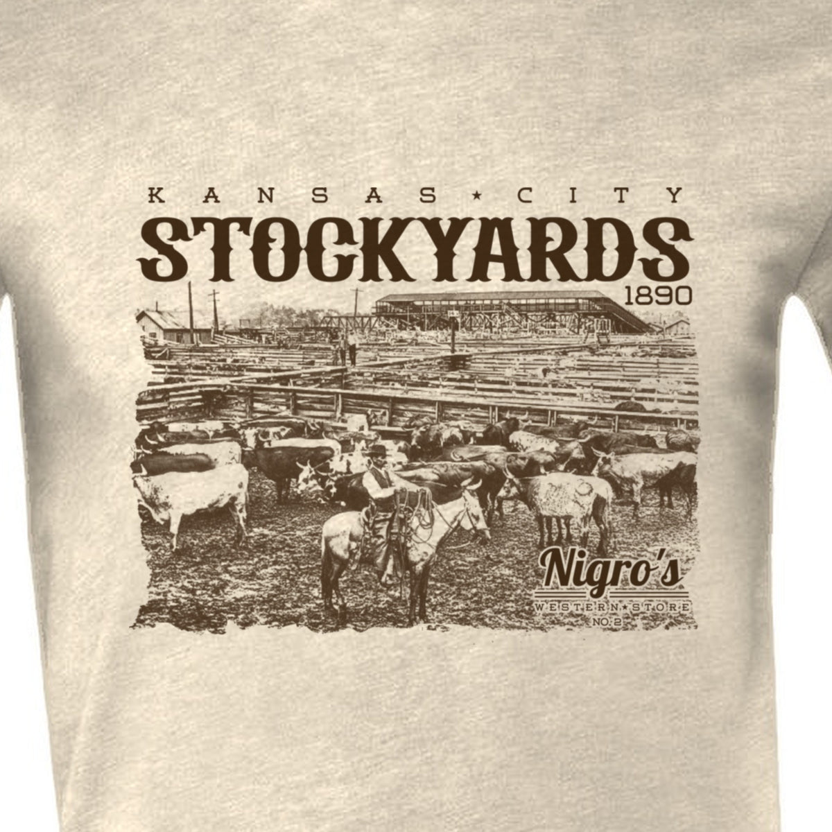 Nigro's Western Store Kansas City Stockyards T-Shirt, Heather Oatmeal – logo close-up