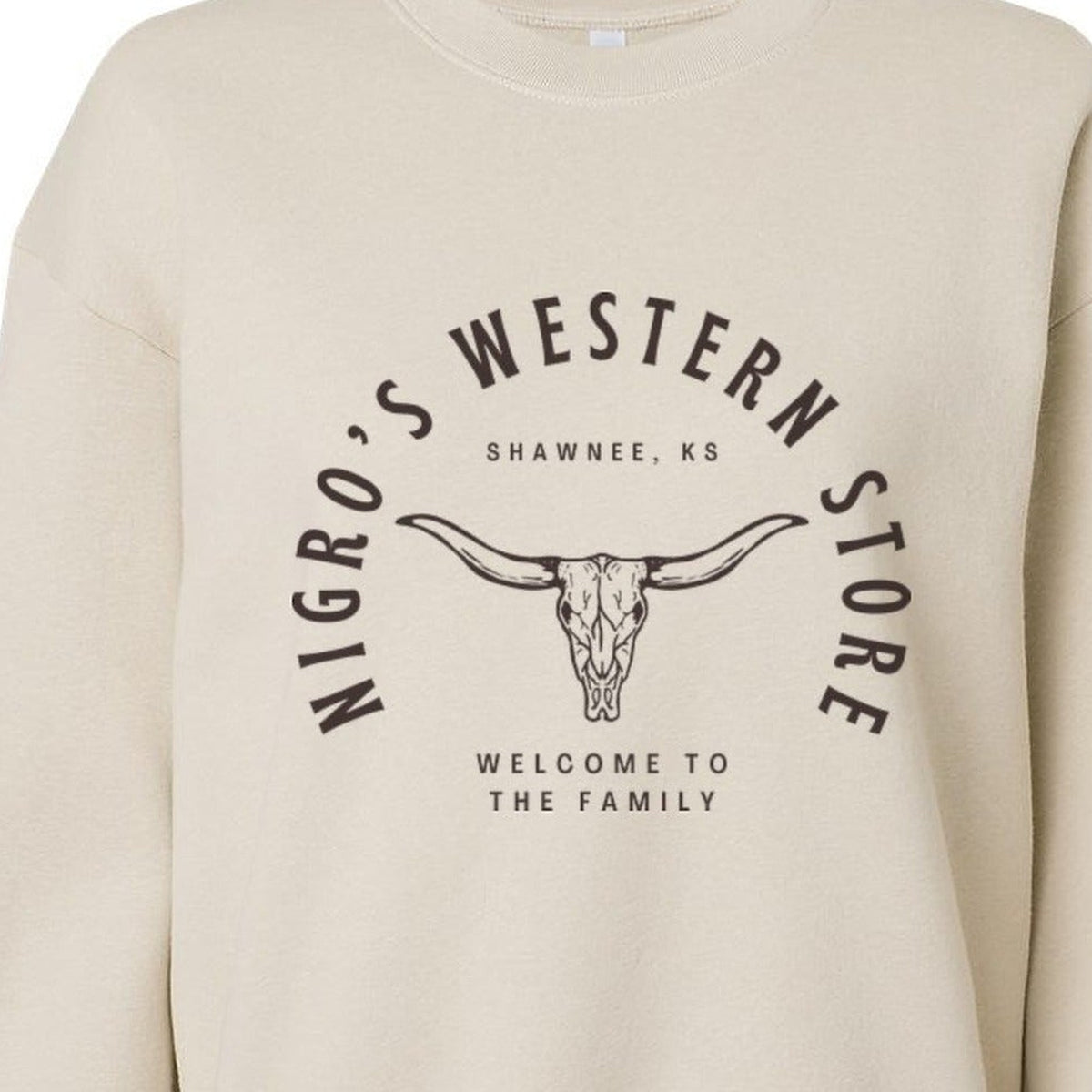 Nigro's Western Store Women's Welcome to the Family Crop Sweatshirt, Bone – logo close-up
