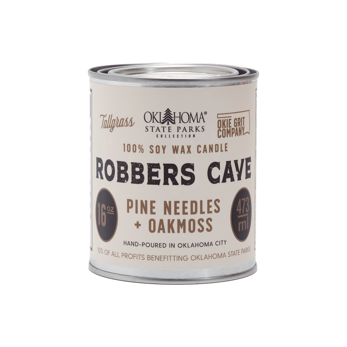Tallgrass Supply Robbers Cave soy wax candle with pine needles and oakmoss scent, featuring a tall glass container and natural design.