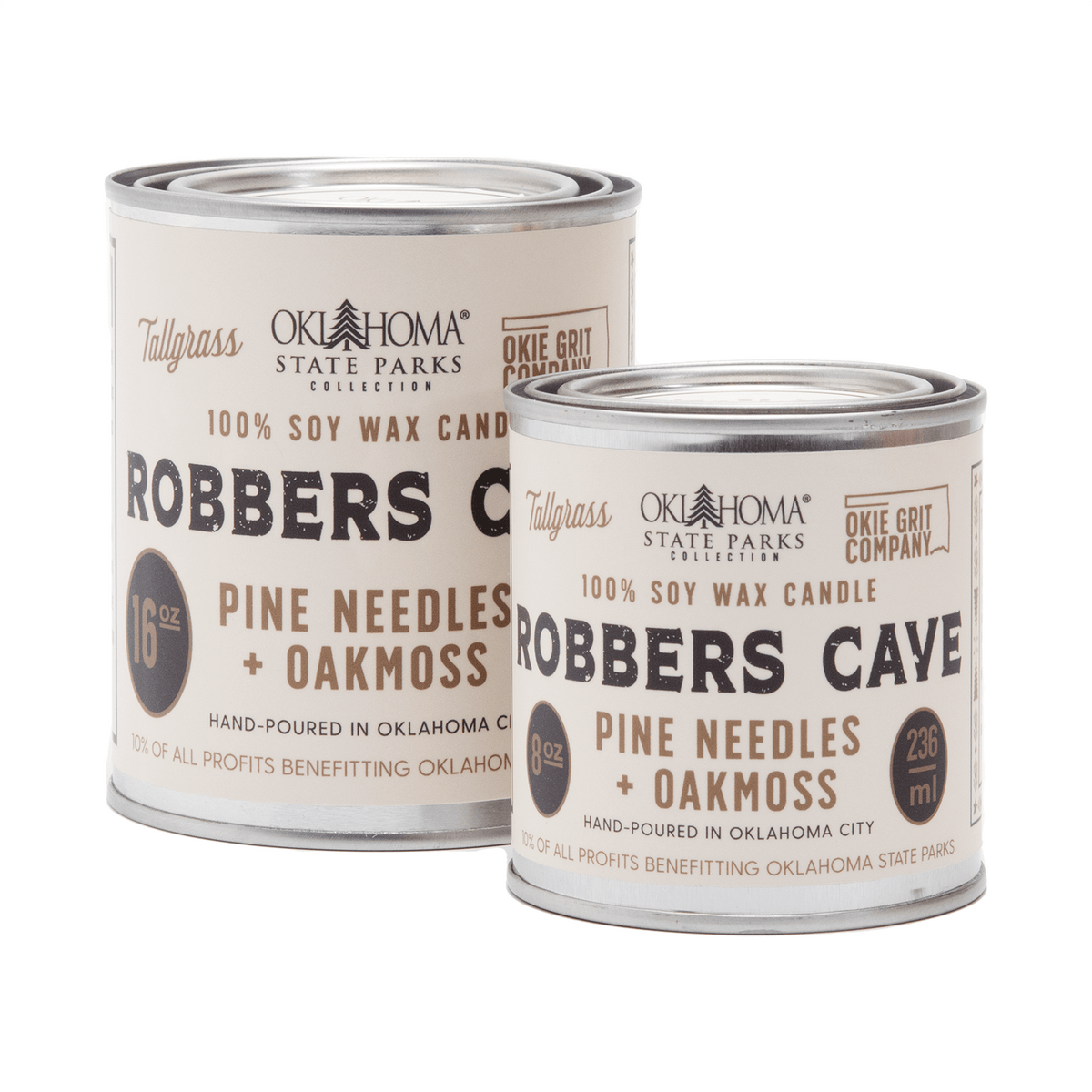 Tallgrass Supply Robbers Cave soy wax candle with pine needles and oakmoss scent, featuring a tall, elegant candle design.