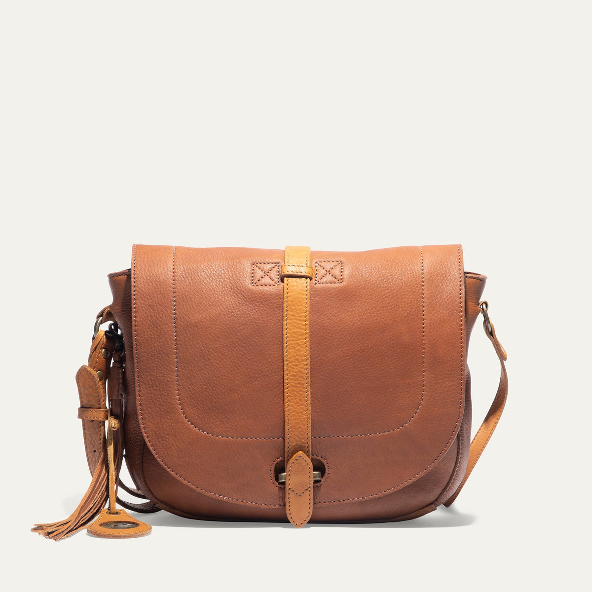 Will Leather Goods Seneca leather crossbody bag with adjustable strap and spacious interior, made from high-quality leather.