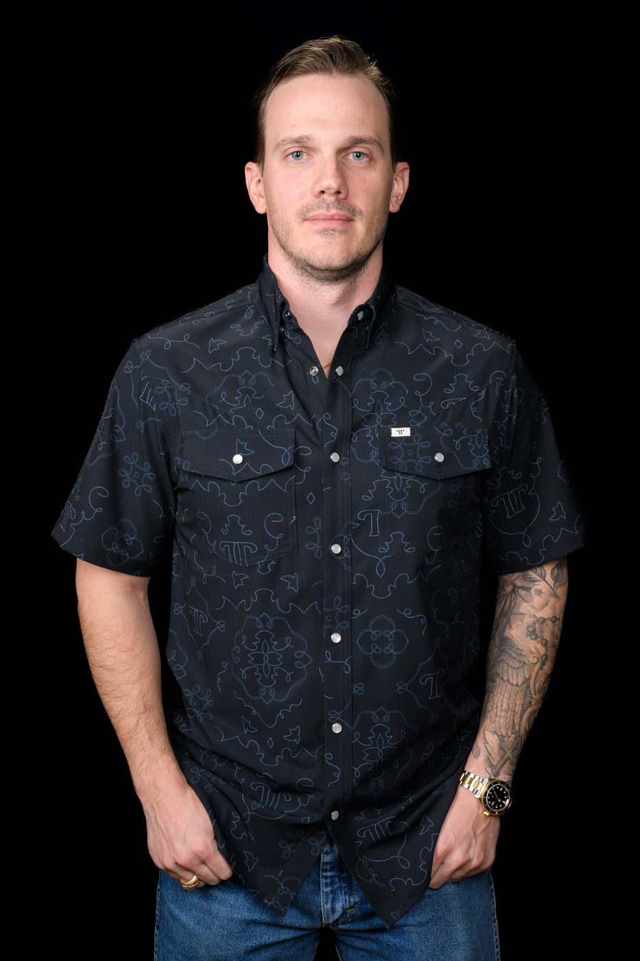 Ferrell Brand Men's Carson Pearl Snap Short Sleeve Shirt, Black – front on model