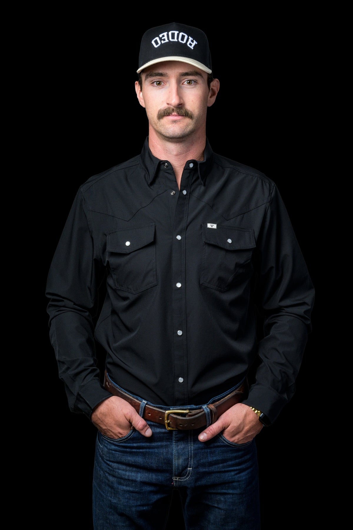 Ferrell Brand Men's Core Pearl Snap Long Sleeve Shirt, Black – front on model