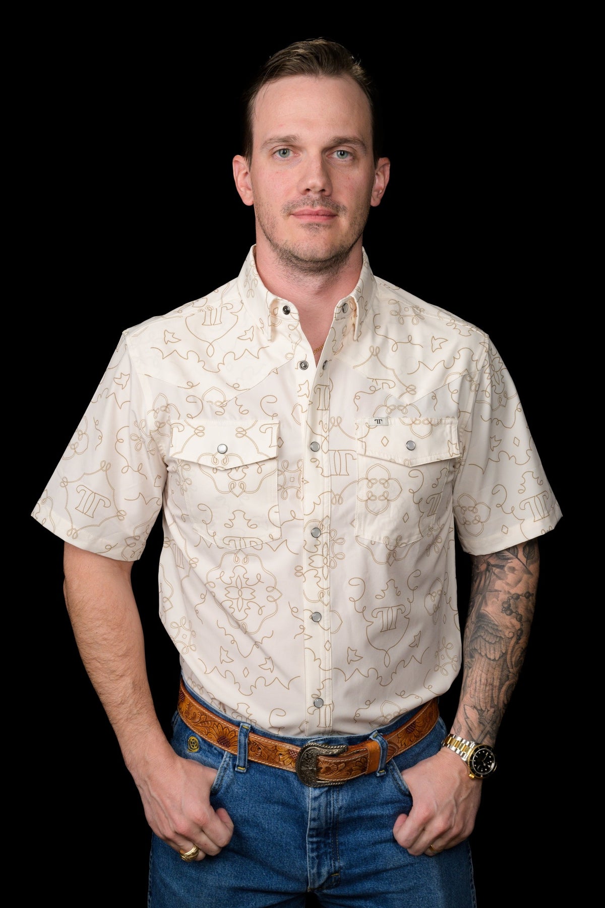 Ferrell Brand Men's Carson Pearl Snap Short Sleeve Shirt, Beige – front on model