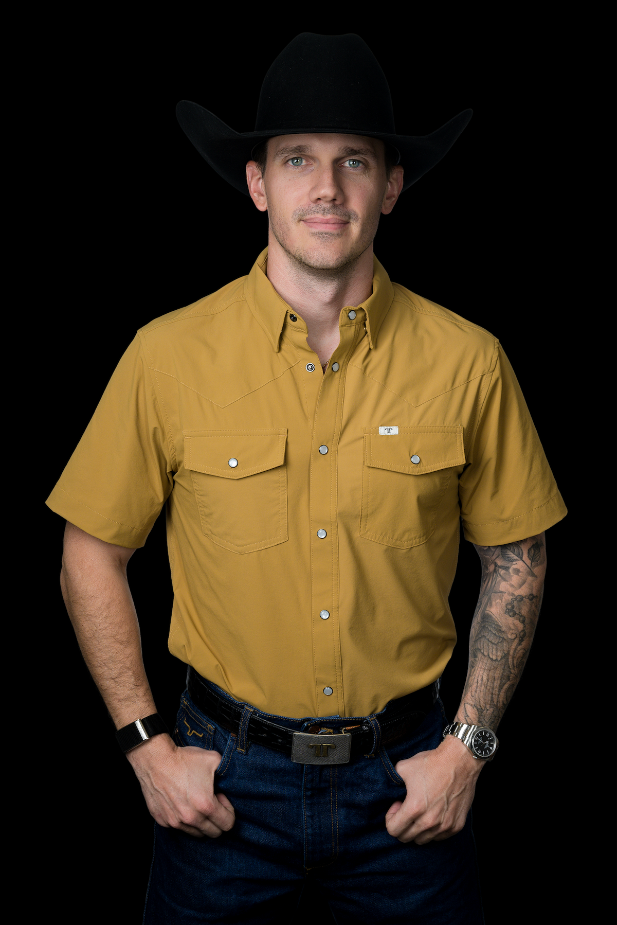 Ferrell Brand Men's Core Pearl Snap Short Sleeve Shirt, Brown – front on model
