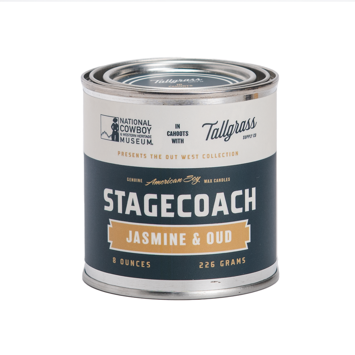 Tallgrass Supply Stagecoach Jasmine and Oud soy wax candle in a glass jar with a wooden lid.