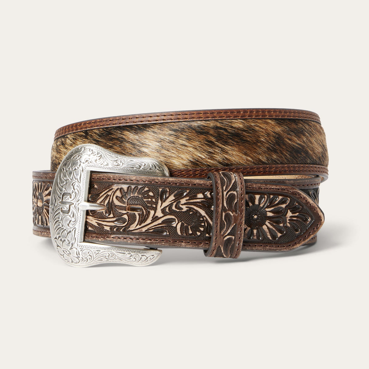 Vintage brown Stetson Hair-on-Hide Tooled Tab Belt by Gem Dandy with intricate tooling and leather details.