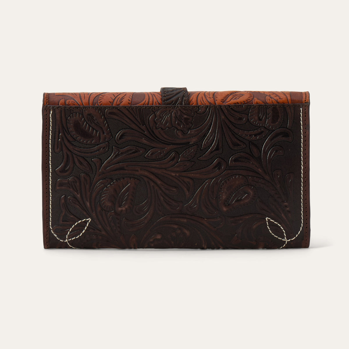 Stetson Tooled Clutch Wallet by Gem Dandy showing detailed tooled leather design and compact wallet shape.
