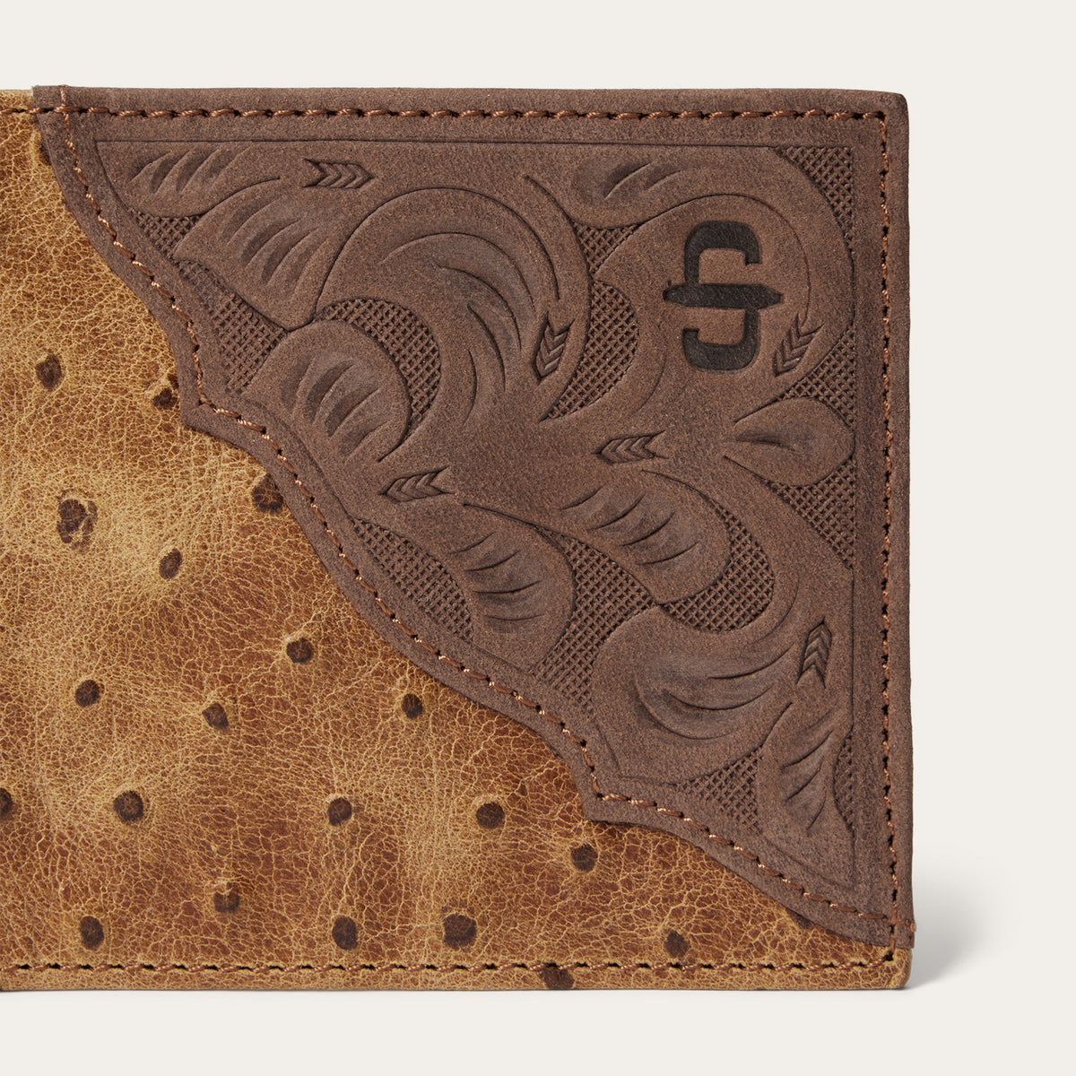 Stetson Tooled Embossed Ostrich Bi-Fold Wallet by Gem Dandy, showcasing detailed tooled leather design and sleek bi-fold style.
