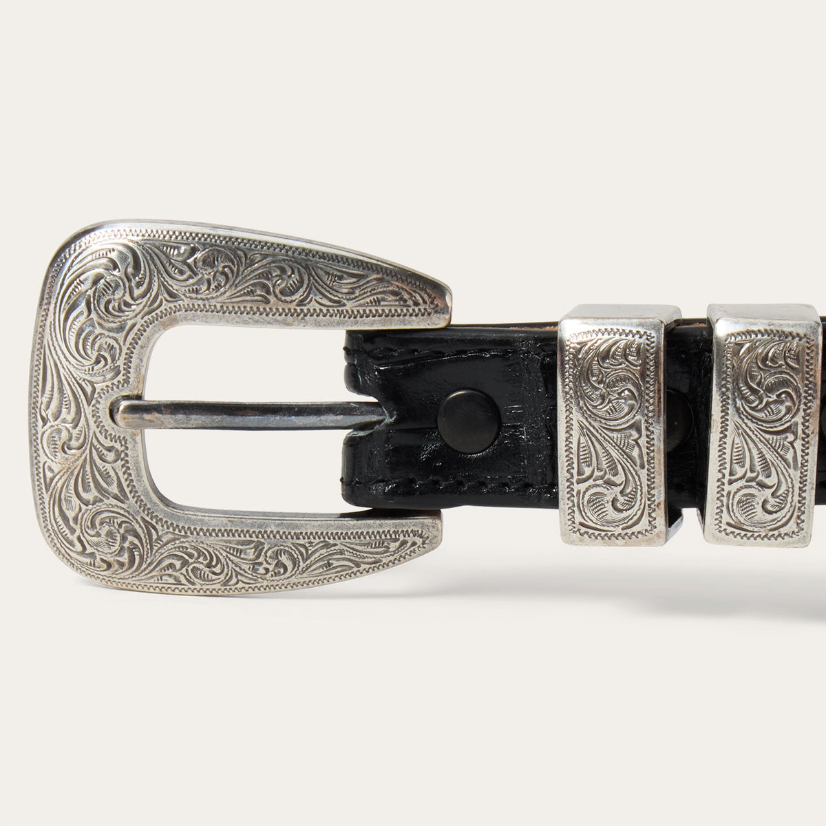 Stetson women's black Caiman leather tapered tab belt with classic buckle, stylish accessory for casual or formal wear.